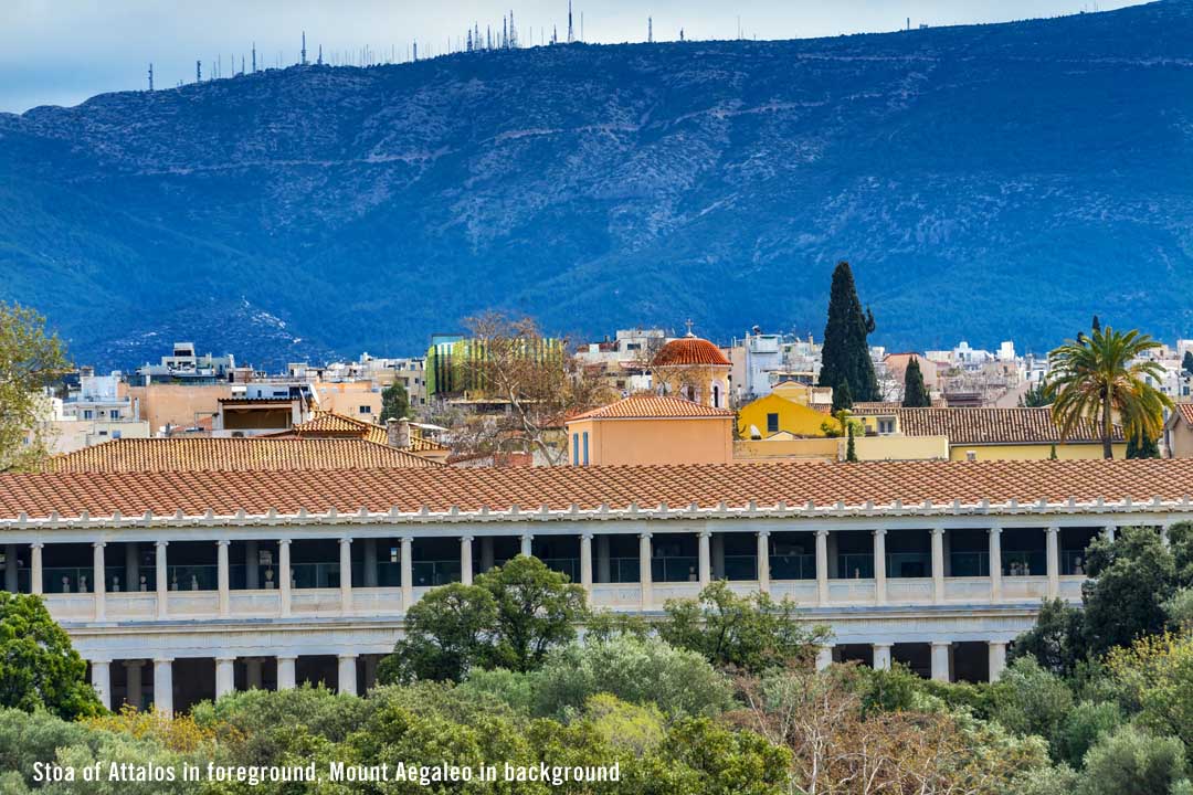 Click on image to enlarge - The Stoa of Attalos in foreground with Mount Aegaleo in the background The Stoa of Attalos in foreground with Mount Aegaleo in the background