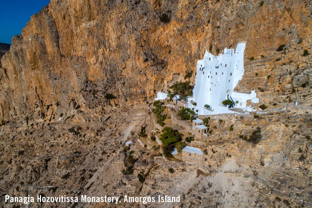 Click to expand and enlarge - the mountainside Panagia Monastery on Amorgos Island The mountainside Panagia Monastery on Amorgos Island