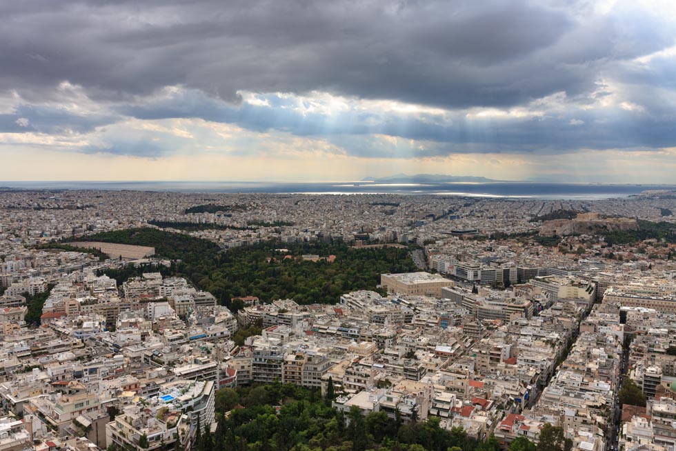 Aerial view over Athens with Piraeus in distance