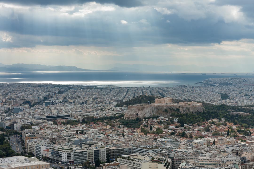 Aerial view over Athens  with Piraeus in distance