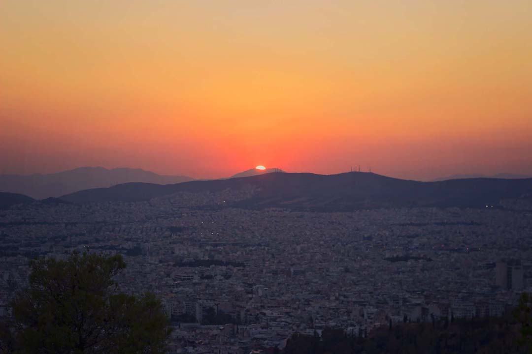 Sunrise over Athens Greece Sunset over Mount Aegaleo in Athens Greece