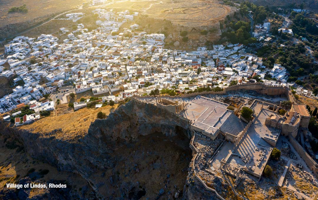 Acropolis of Rhodes Island at Village of Lindos - Aerial View from Drone